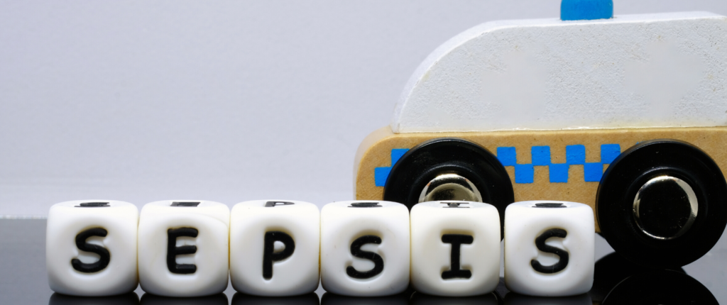 Die Worte Sepsis mit auf Würfeln aufgedruckten Buchstaben geschrieben